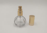 Botella de cristal del espray del perfume de oro de la bomba redonda con la impresión modificada para requisitos particulares de los logotipos